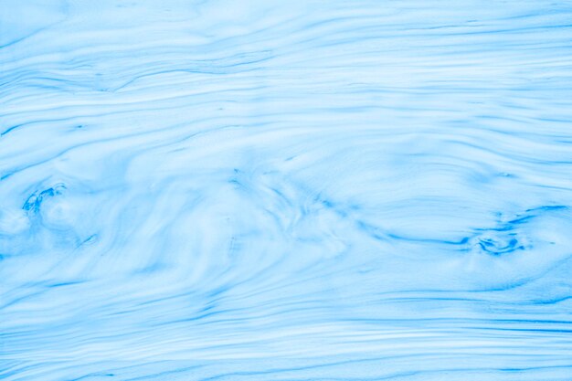 Fondo de textura de grano de madera de color azul claro transparente