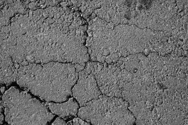 Fondo de la textura de la grieta de la carretera de asfalto