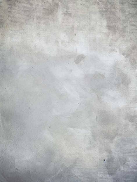 un fondo de textura gris con una textura blanca que dice un