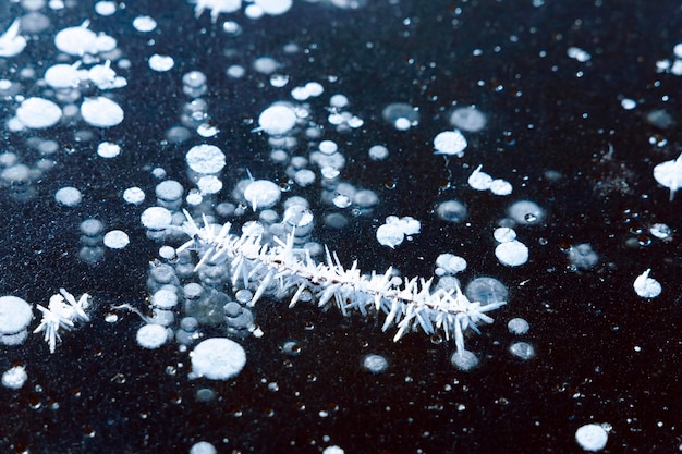 Fondo de textura de hielo con palo congelado y burbujas