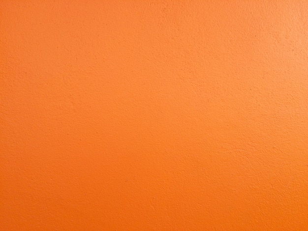 Fondo de textura de hormigón naranja.