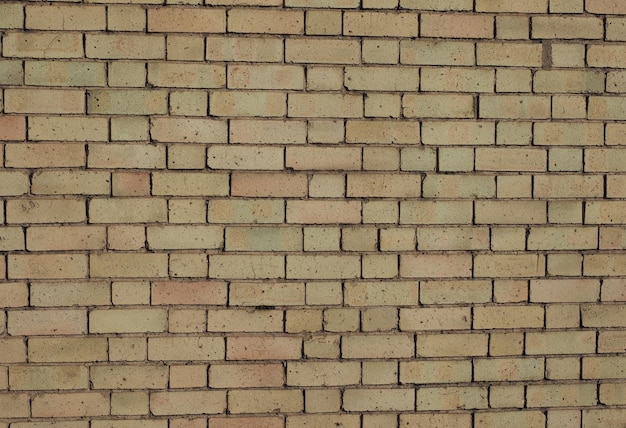 Fondo de textura de ladrillo amarillo