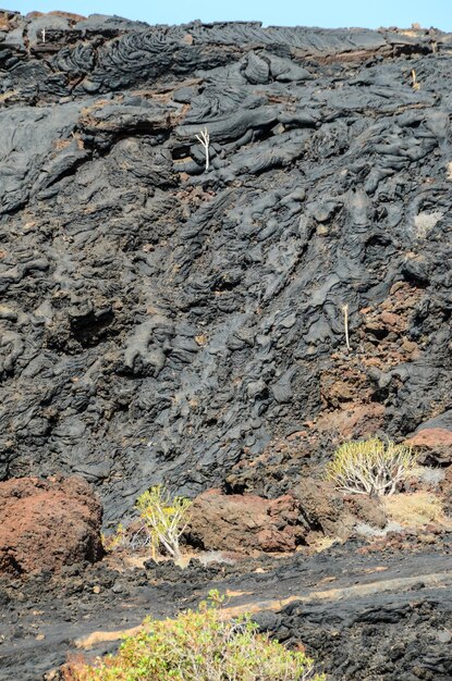 Fondo de textura de lava negra seca volcánica en Canarias