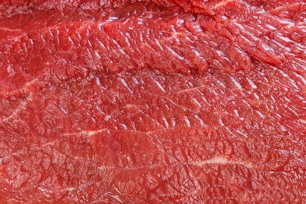 Foto fondo de textura macro de carne de res roja cruda