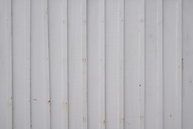 Fondo de textura de madera gris blanco con viejos tablones de madera pintados de gris claro