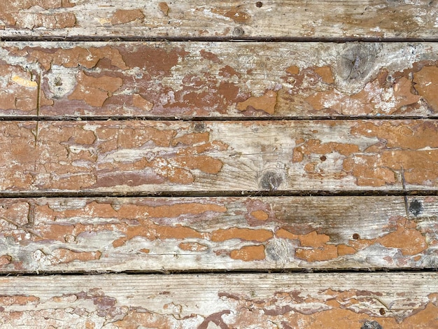 Fondo de textura de madera tratada natural con textura de pintura descascarada de troncos de árboles pintados