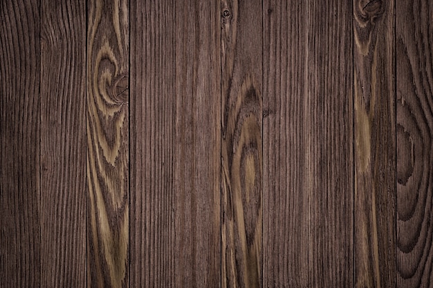 Fondo de textura de madera vieja con luz solar moteada