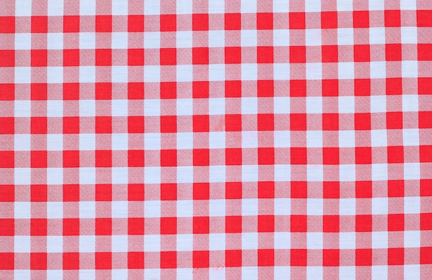 Foto fondo de textura de mantel a cuadros clásico rojo con espacio de copia