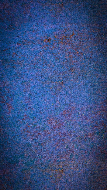 Foto fondo de textura de metal azul. superficie de metal oxidado. foto de fondo vertical con espacio de copia.