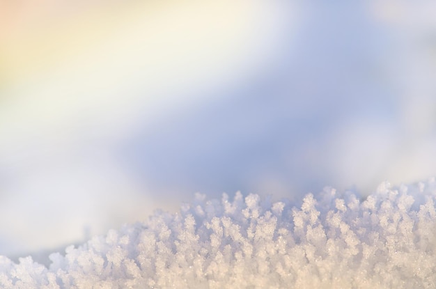 Fondo de textura de nieve Textura de nieve fresca Nieve brillante con bokeh