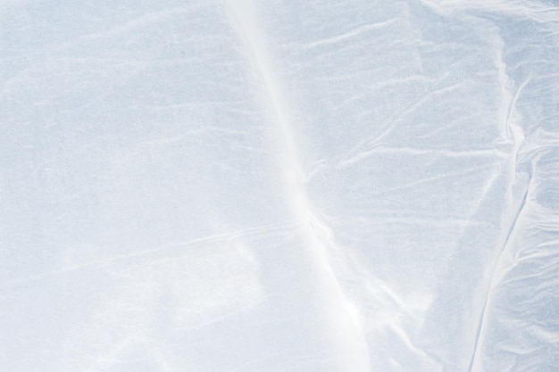 Fondo de textura de papel arrugado y arrugado blanco en blanco