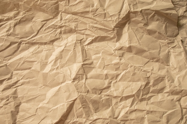 Fondo de textura de papel arrugado marrón cerca