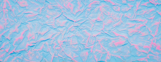 Fondo de textura de papel arrugado pintado de azul y rojo