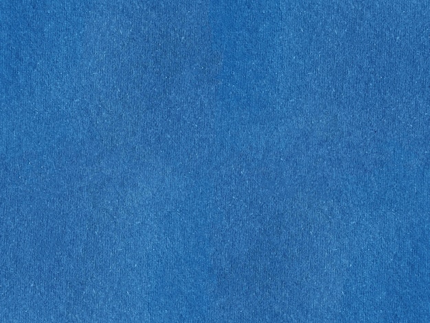 Fondo de textura de papel azul abstracto.