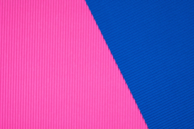 Fondo de textura de papel corrugado azul y rosa