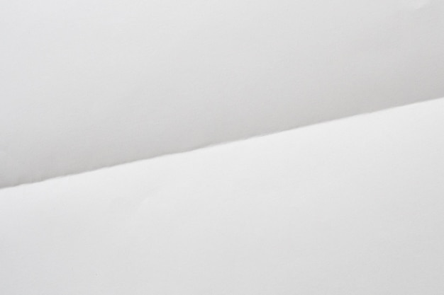Foto fondo de textura de papel doblado y arrugado blanco