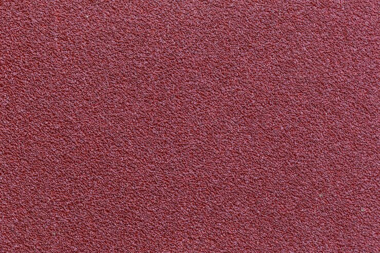Fondo de textura de papel de lija rojo