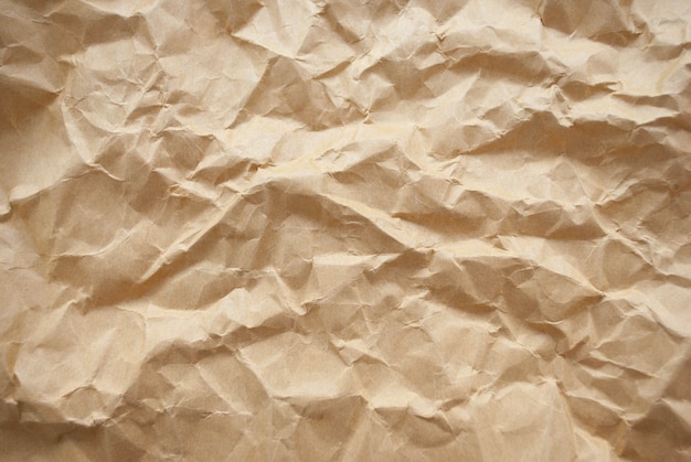 Fondo y textura de papel marrón arrugado