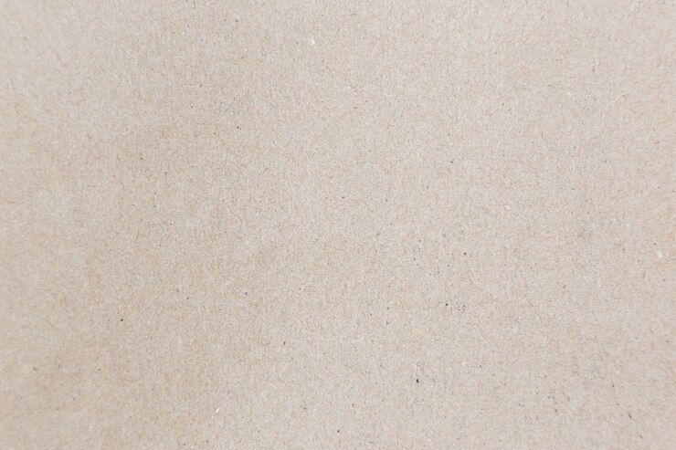 Fondo de textura de papel marrón o superficie de cartón de un embalaje de caja de papel
