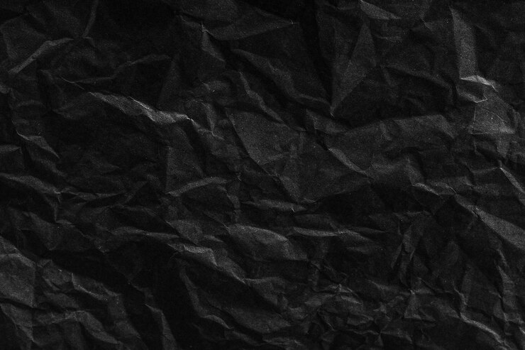 Foto fondo de textura de papel negro arrugado dañado áspero con arrugas