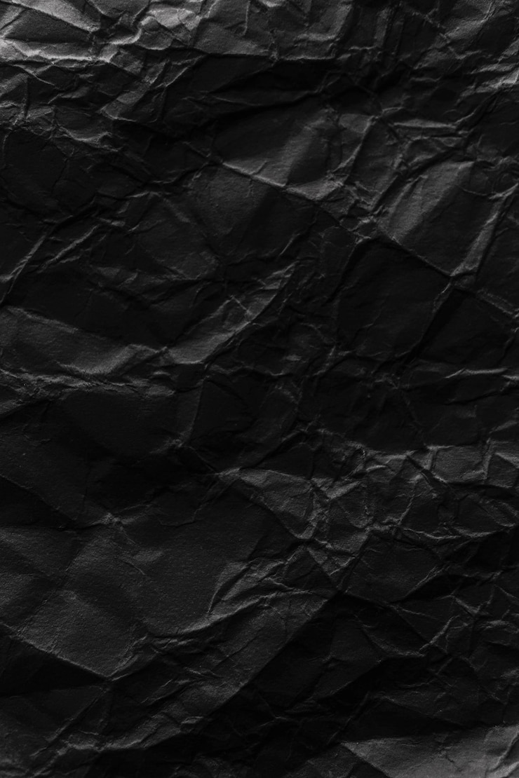 Foto fondo de textura de papel negro arrugado dañado áspero con arrugas
