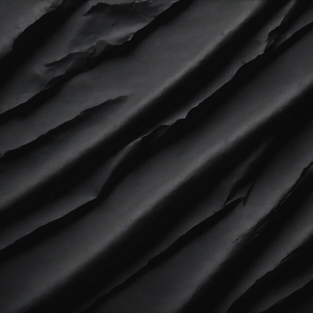 Fondo de textura de papel negro rugoso dañado y arrugado con arrugas