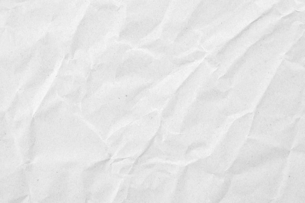 Fondo de textura de papel reciclado blanco abstractamente arrugado y arrugado