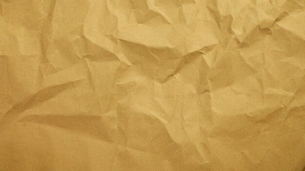 Fondo de textura de papel reciclado Fondo de forma abstracta de papel kraft antiguo arrugado con espacio Papel arrugado amarillo para texto de alta resolución
