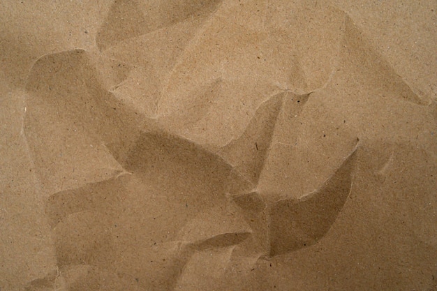 Fondo de textura de papel reciclado Fondo de forma abstracta de papel kraft antiguo arrugado con papel espacial para texto de alta resolución