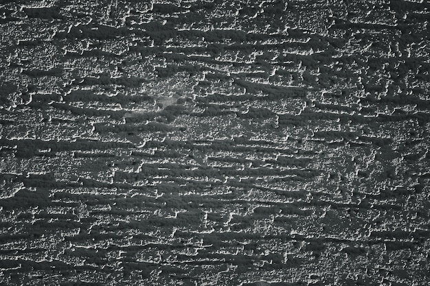 Foto fondo con textura de pared de cemento con textura oscura.