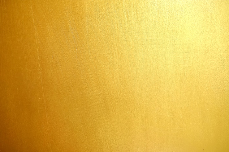 Foto fondo de textura de pared dorada