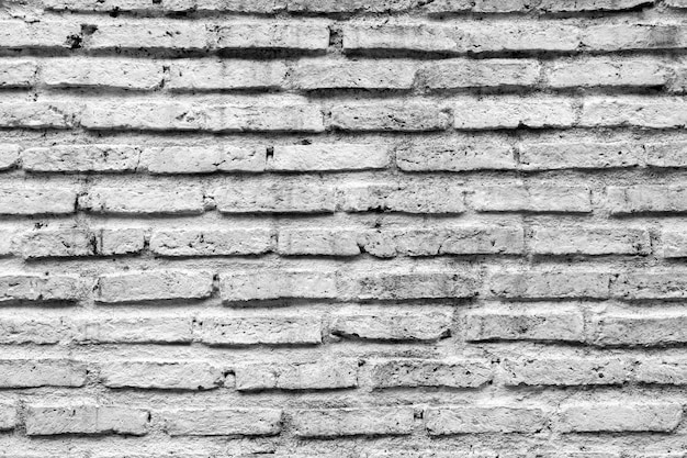 Fondo de textura de pared de ladrillo blanco antiguo