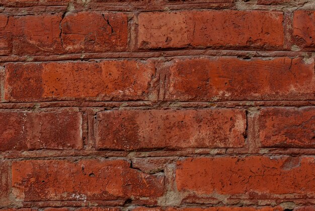 Fondo de textura de pared de ladrillo rojo viejo cerrar