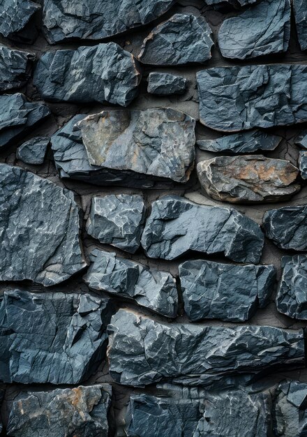 Foto fondo de textura de pared de piedra áspera de color gris oscuro