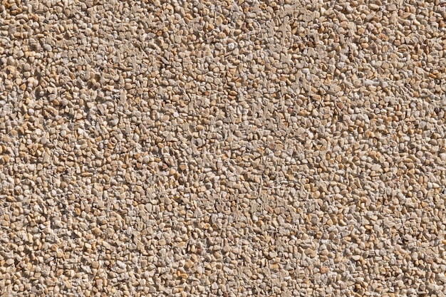 Fondo de textura de pared de piedra beige