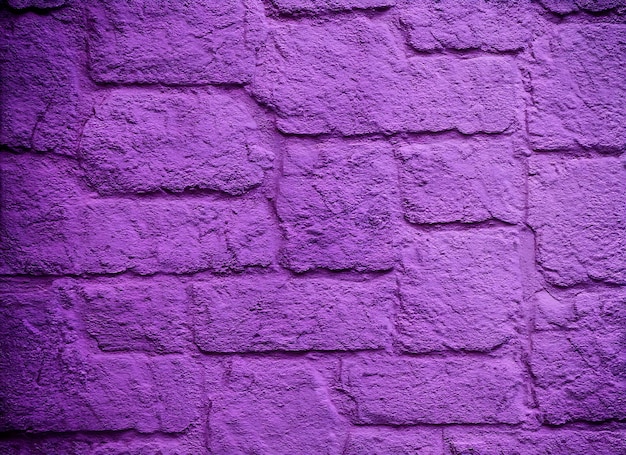 Foto fondo de textura de pared de piedra púrpura