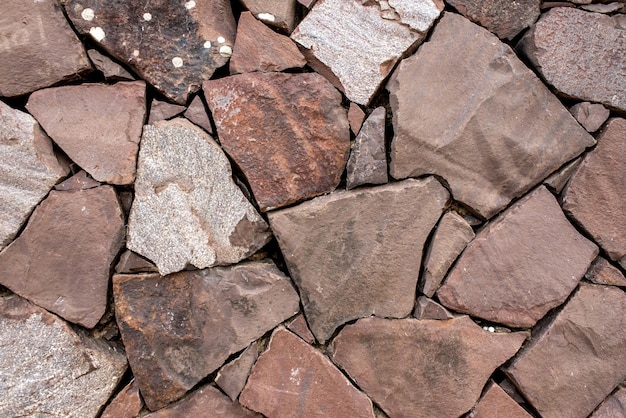 Fondo de textura de pared de piedra triturada