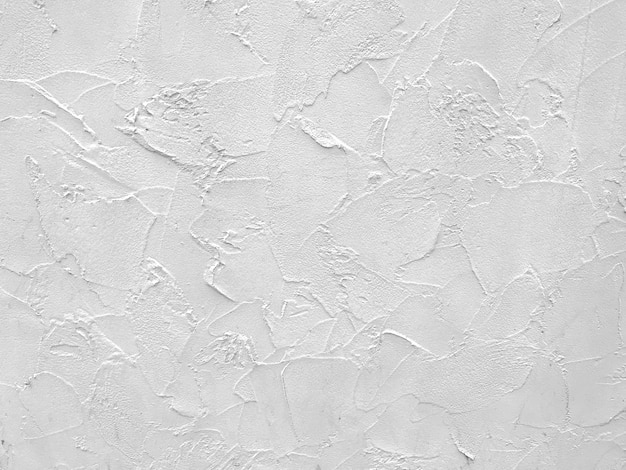 Fondo de la textura de la pared del yeso del cemento blanco.