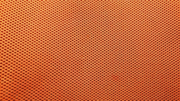 Fondo de textura de patrón de tela de nylon naranja