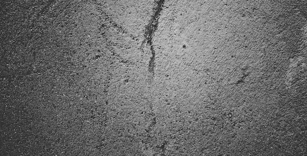 Fondo de textura de piedra granulada negra o fondo de textura gris oscuro