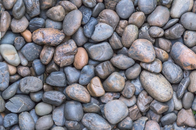 Fondo de textura de piedra guijarros para decoración exterior interior