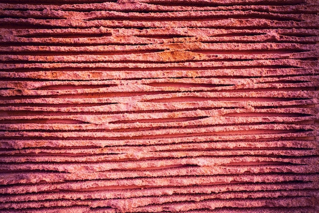 Foto fondo de textura de piedra prensada en color marsala