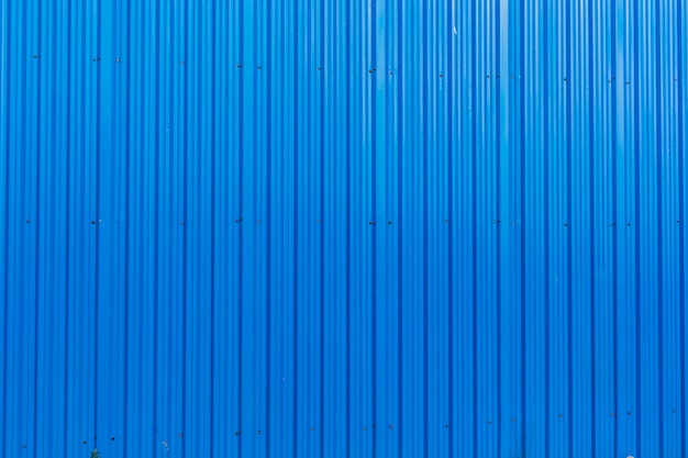 Fondo de textura de rayas verticales de superficie de metal azul