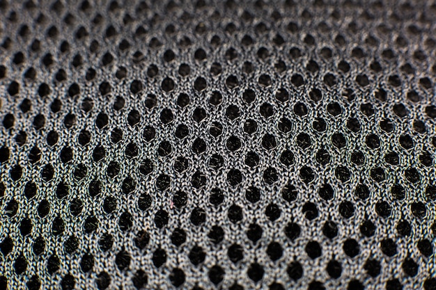 Fondo de textura de red de algodón trenzado negro. De cerca.