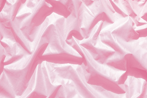 Fondo de textura de rosa Pacífico metálico. Tela gris arrugada.