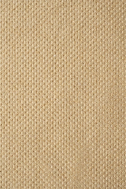 Foto fondo de textura de servilleta de papel de tejido reciclado marrón abstracto