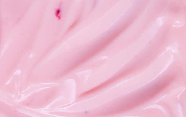 Fondo de textura de la superficie de helado de yogur rosa