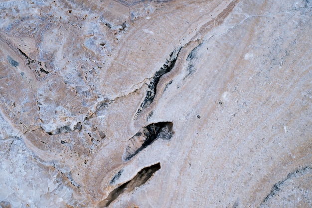 Fondo de textura de superficie de piedra marrón oxidado de cerca