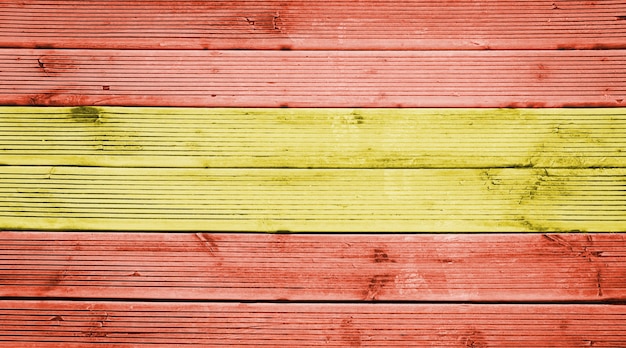 Fondo de textura de tablones de madera natural con los colores de la bandera de España