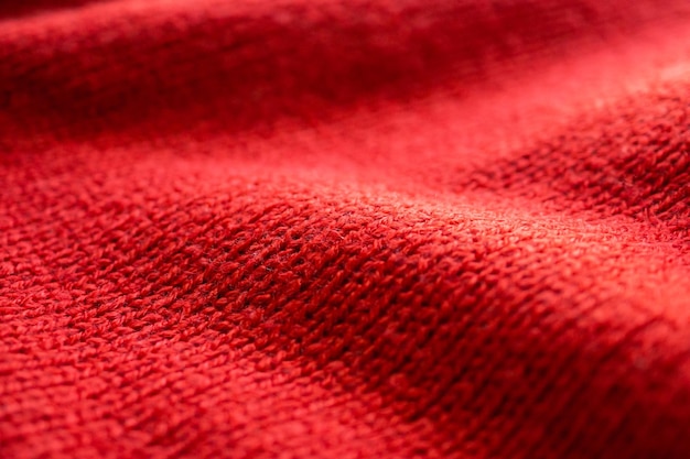 Fondo de textura de tejido de lana de punto rojo de primer plano